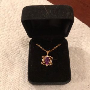 Necklace it’s purple and gold